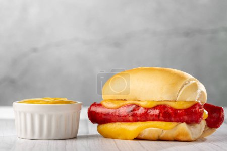 Photo for Sausage sandwich with melted cheese. - Royalty Free Image