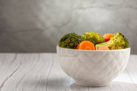 Photo for Bowl with broccoli and carrot salad. - Royalty Free Image