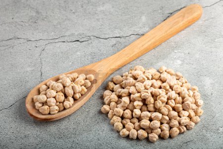 Photo for Pile of raw chickpeas on the table. - Royalty Free Image