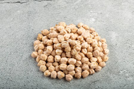 Photo for Pile of raw chickpeas on the table. - Royalty Free Image