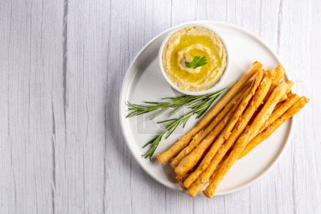Photo for Homemade Grissini with Chickpea Hummus. - Royalty Free Image