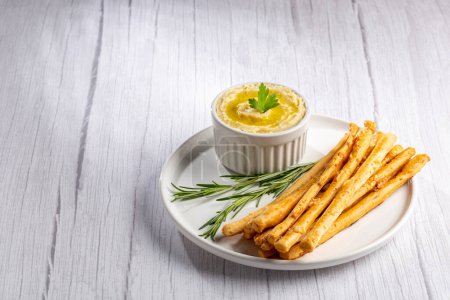 Photo for Homemade Grissini with Chickpea Hummus. - Royalty Free Image