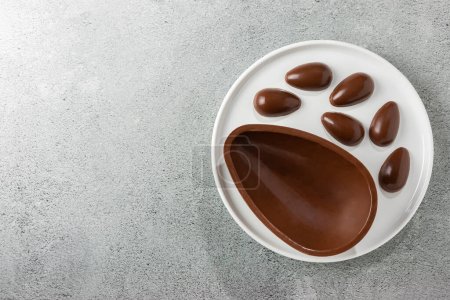 Photo for Chocolate easter egg on the table. - Royalty Free Image