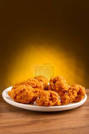 Crispy fried chicken on the plate.