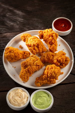 Photo for Crispy fried chicken with sauces. - Royalty Free Image