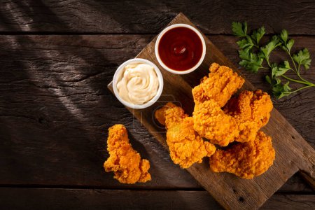 Photo for Crispy fried chicken with sauces. - Royalty Free Image
