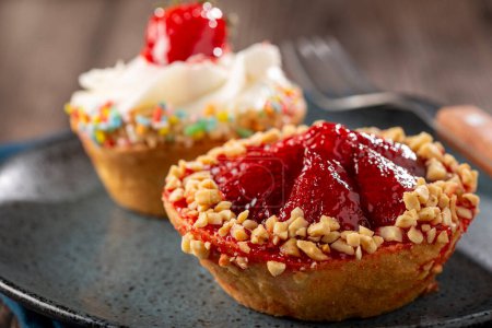 Delicious strawberry tartlet on the table.