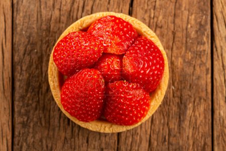 Photo for Tasty strawberry tartlet on the table. - Royalty Free Image