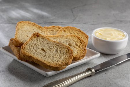 Photo for Healthy wholemeal toast with butter. - Royalty Free Image
