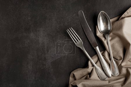 Photo for Antique cutlery on the table. Vintage cutlery. - Royalty Free Image
