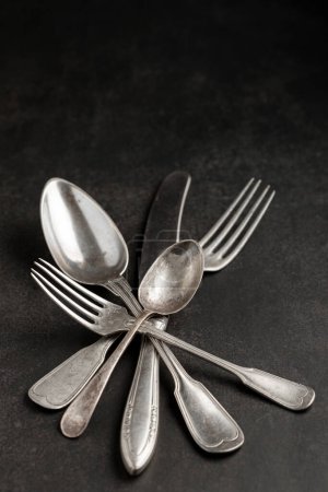 Antique cutlery on the table. Vintage cutlery.