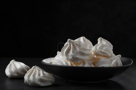 Photo for Delicious meringue cookies on the table. - Royalty Free Image