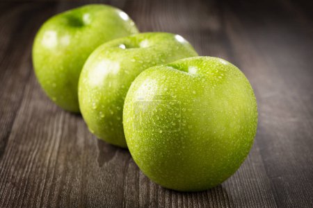 Photo for Green apples on the table. - Royalty Free Image