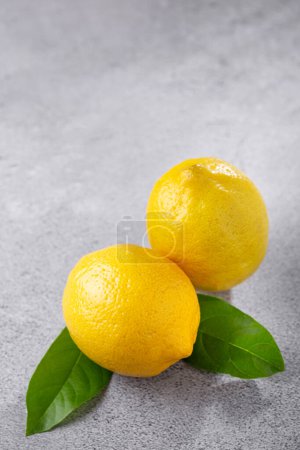 Photo for Fresh italian lemons on the table. Sicilian lemon. - Royalty Free Image