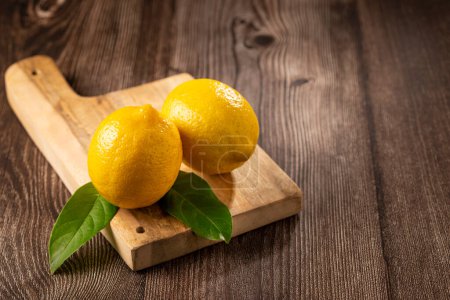 Photo for Fresh italian lemons on the table. Sicilian lemon. - Royalty Free Image