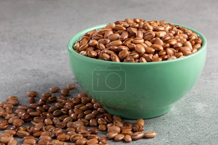 Photo for Raw carioca beans on the table. - Royalty Free Image
