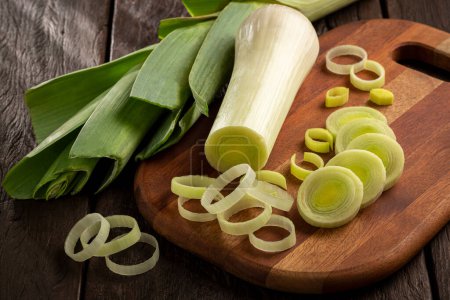 Photo for Sliced leek on wooden table - Royalty Free Image