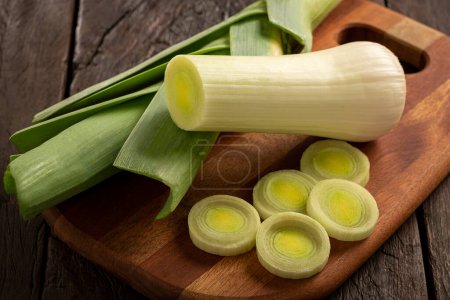 Photo for Sliced leek on wooden table - Royalty Free Image
