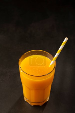 Photo for Mango juice in glass cup on the table. Mango smoothie. - Royalty Free Image