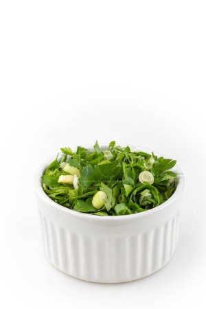 Photo for Coriander in ramekin isolated on white background. - Royalty Free Image