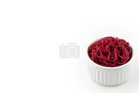 Grated beets isolated on white background.