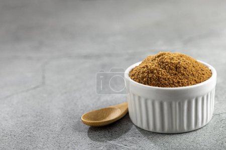 Photo for Brown sugar in ramekin on the table. - Royalty Free Image