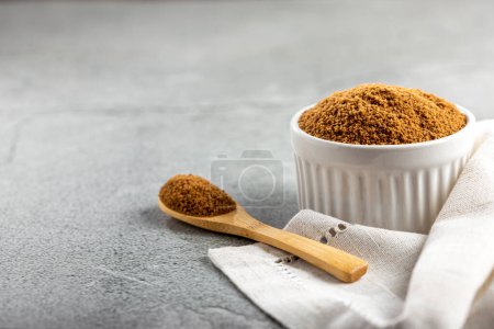 Photo for Brown sugar in ramekin on the table. - Royalty Free Image