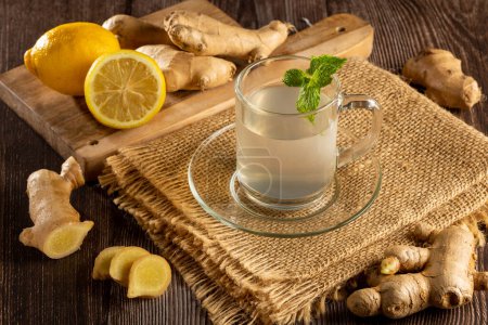 Photo for Ginger tea with Sicilian lemon and mint. - Royalty Free Image