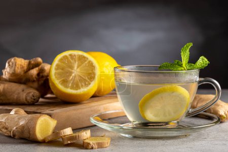 Photo for Ginger tea with Sicilian lemon and mint. - Royalty Free Image