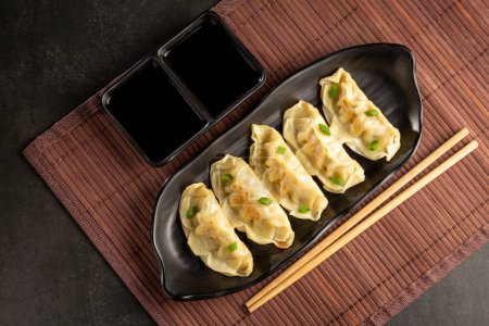 Photo for Gyoza or Jiaozi Traditional Chinese and Japanese food. - Royalty Free Image