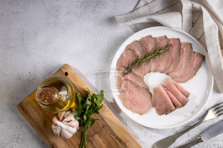Photo for Sliced roast beef on plate. - Royalty Free Image