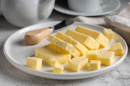 Photo for Fresh butter from the farm on the table. Butter tablet. - Royalty Free Image