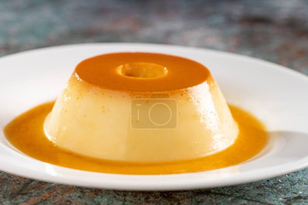 Photo for Condensed milk pudding. Brazilian traditional dessert. - Royalty Free Image