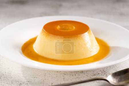 Photo for Condensed milk pudding. Brazilian traditional dessert. - Royalty Free Image