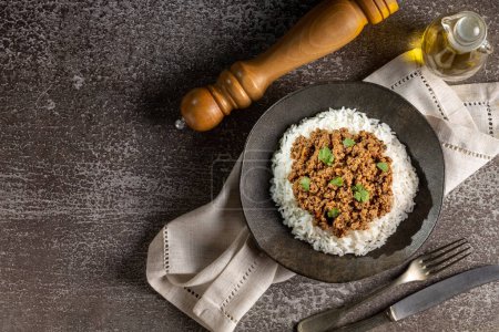 Photo for Rice with minced meat on the plate. - Royalty Free Image