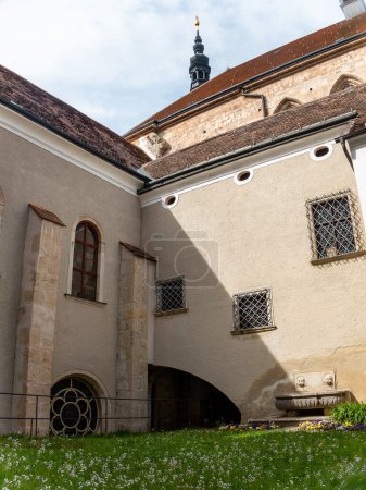 Heiligenkreuz, Austria - April 14, 2024: overall view on the details of exterior and interior of the Stift Heiligenkreuz abbey