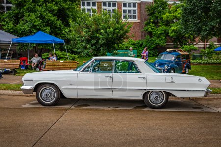 Photo for Des Moines, IA - July 01, 2022: High perspective side view of a 1963 Chevrolet Impala 4 door Hardtop at a local car show. - Royalty Free Image