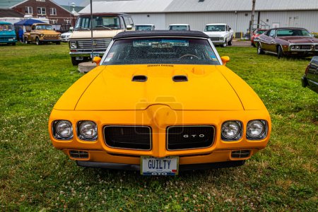 Photo for Des Moines, IA - July 01, 2022: High perspective front view of a 1970 Pontiac GTO Convertible at a local car show. - Royalty Free Image