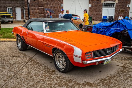 Photo for Des Moines, IA - July 01, 2022: High perspective front corner view of a 1969 Chevrolet Camaro RS Convertible at a local car show. - Royalty Free Image
