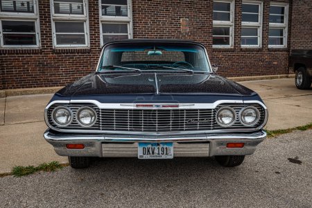 Photo for Des Moines, IA - July 01, 2022: High perspective front view of a 1964 Chevrolet Impala Convertible at a local car show. - Royalty Free Image