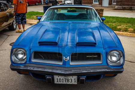Photo for Des Moines, IA - July 01, 2022: High perspective front view of a 1974 Pontiac Firebird Formula 400 Coupe at a local car show. - Royalty Free Image