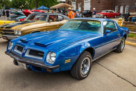 Photo for Des Moines, IA - July 01, 2022: High perspective front corner view of a 1974 Pontiac Firebird Formula 400 Coupe at a local car show. - Royalty Free Image