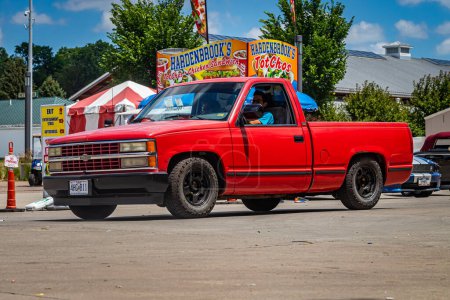 Photo for Des Moines, IA - July 03, 2022: Wide angle front corner view of a 1995 Chevrolet Silverado 1500 Pickup at a local car show. - Royalty Free Image
