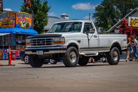 Photo for Des Moines, IA - July 03, 2022: Wide angle front corner view of a 1997 Ford F-250 Pickup Truck at a local car show. - Royalty Free Image