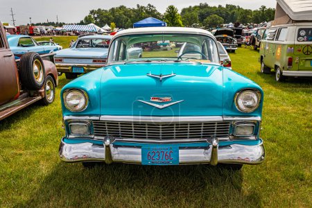 Photo for Iola, WI - July 07, 2022: High perspective front view of a 1956 Chevrolet BelAir 4 Door Sedan at a local car show. - Royalty Free Image