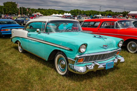 Photo for Iola, WI - July 07, 2022: High perspective front corner view of a 1956 Chevrolet BelAir Hardtop Coupe at a local car show. - Royalty Free Image