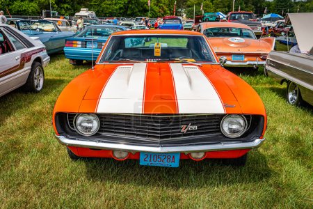 Photo for Iola, WI - July 07, 2022: High perspective front view of a 1969 Chevrolet Camaro Z28 Sport Coupe at a local car show. - Royalty Free Image