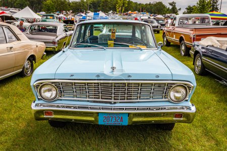 Photo for Iola, WI - July 07, 2022: High perspective front view of a 1964 Ford Falcon Station Wagon at a local car show. - Royalty Free Image