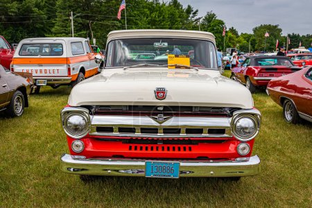 Photo for Iola, WI - July 07, 2022: High perspective front view of a 1957 Ford F-250 Styleside Pickup Truck at a local car show. - Royalty Free Image