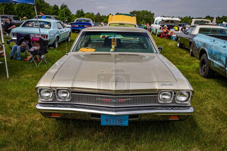 Photo for Iola, WI - July 07, 2022: High perspective front view of a 1968 Chevrolet Chevelle Malibu 4 Door Sedan at a local car show. - Royalty Free Image